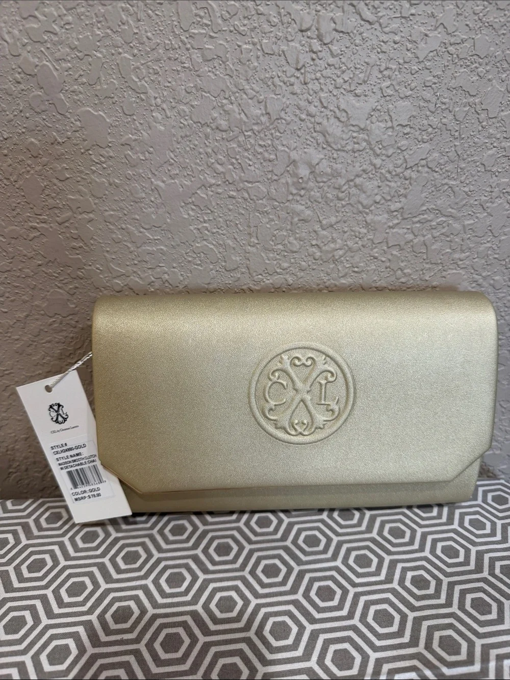 Christian Lacroix Metallic Gold Embossed Logo Clutch